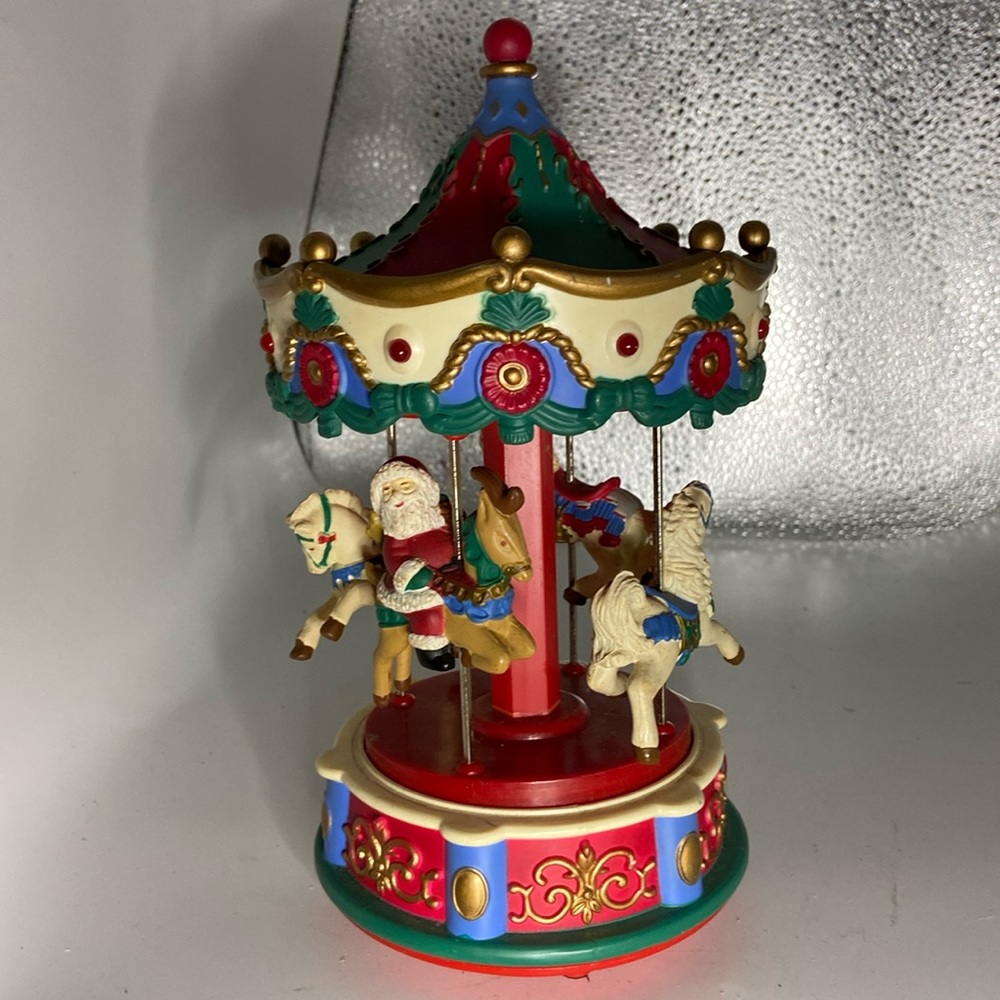 Musical Carousel horses revolve around Very cute Red button on base is switch